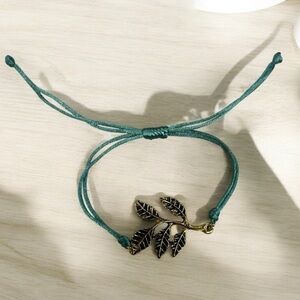 Knotted Bracelet with Golden Leaves